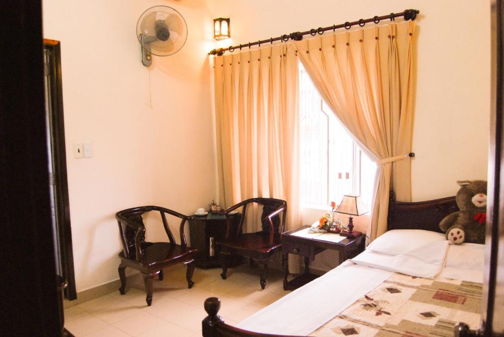 Binh Minh Sunrise Hue Hotell Rom bilde