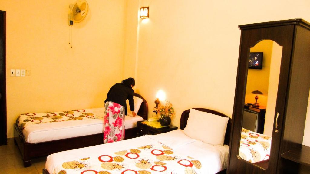 Binh Minh Sunrise Hue Hotell Rom bilde