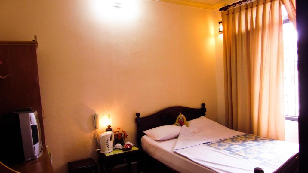 Binh Minh Sunrise Hue Hotell Rom bilde